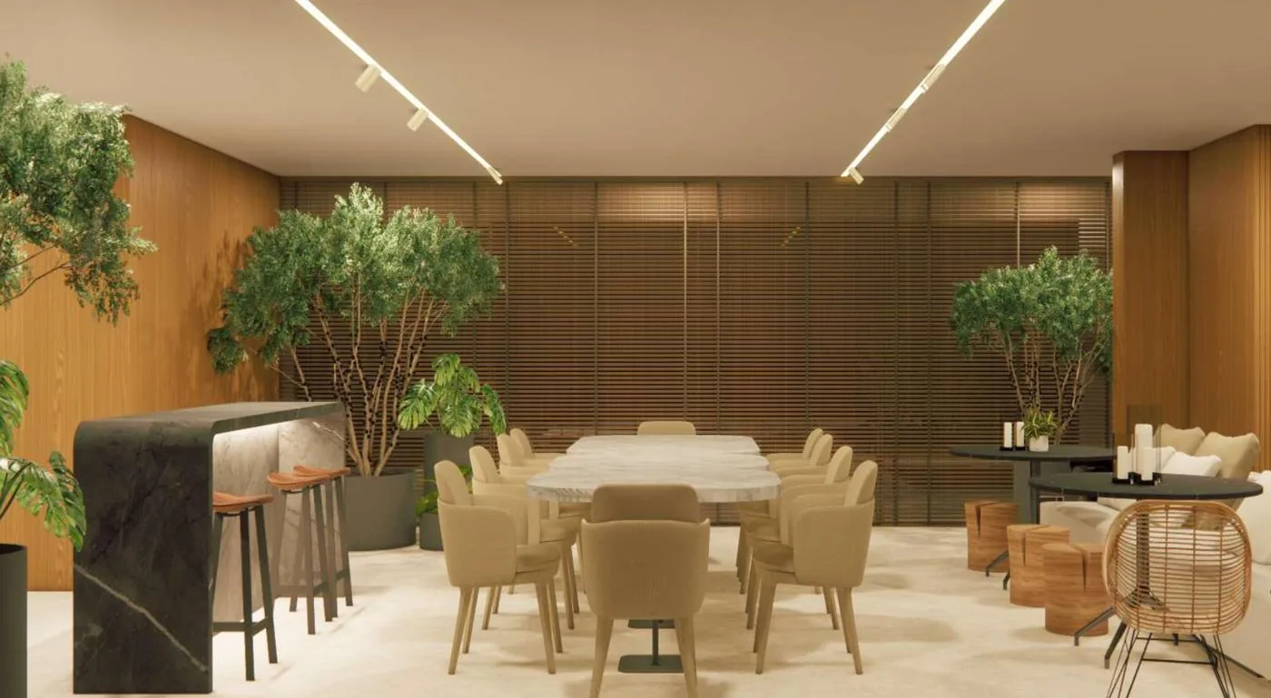 Espaço gourmet com mesa longa e bar